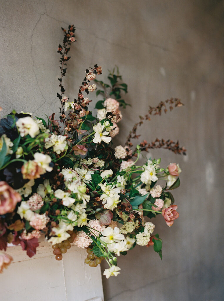 Studio branding session image of florals set on a mantle