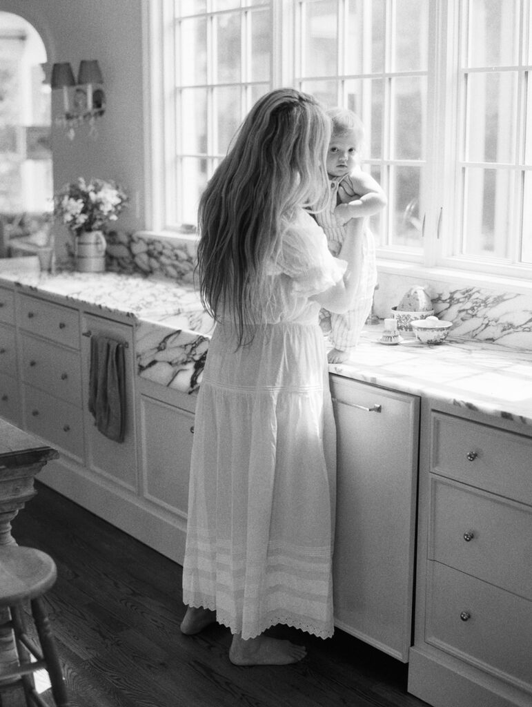 Carley Summers in her kitchen with her son Max
