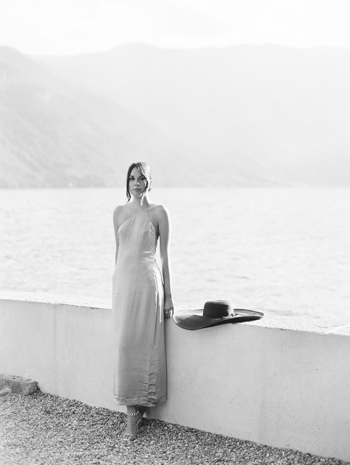 Portrait in black and white of girl on shores of Lake Como, Italy